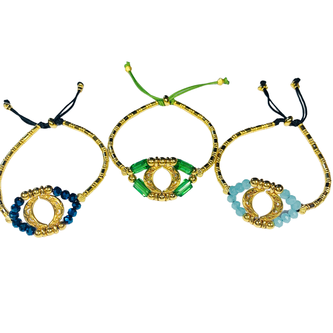 EYE CRYSTAL BRACELET WITH A NAVY/EMERALD/TURQUOISE AUSTRIAN CRYSTAL AND GOLD PLATED BEADS EYE MOTIF