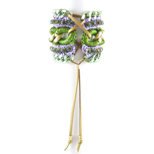 MUSES CUFF BRACELET IN GREEN AND LILAC SILK THREAD, EMERALD SWAROVSKI CRYSTAL CUP CHAIN AND GREEN CHAIN DETAIL