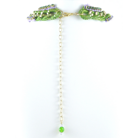 URANIA BIB NECKLACE IN GREEN AND LILAC SILK THREAD WITH LILAC AND EMERALD SWAROVSKI CRYSTAL CUP CHAIN DETAIL