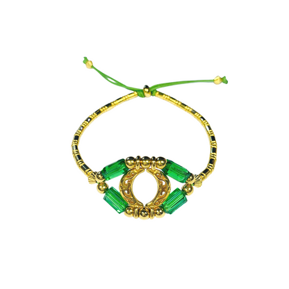 EYE CRYSTAL BRACELET WITH AN EMERALD AUSTRIAN CRYSTAL AND GOLD PLATED BEADS EYE MOTIF