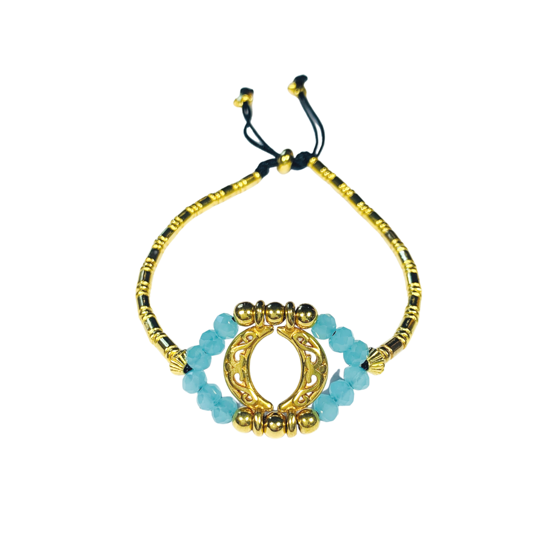 EYE CRYSTAL BRACELET WITH A TURQUOISE AUSTRIAN CRYSTAL AND GOLD PLATED BEADS EYE MOTIF