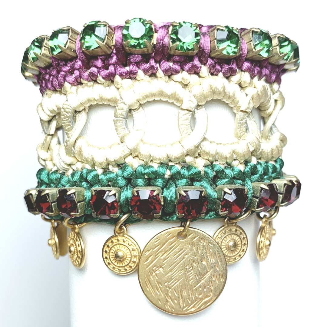 GAIA CUFF BRACELET IN BEIGE, BORDEAUX AND EMERALD SILK THREAD AND BORDEAUX AND EMERALD SWAROVSKI CRYSTAL CUP CHAIN DETAIL WITH 24K GOLD PLATED DISC DROPS